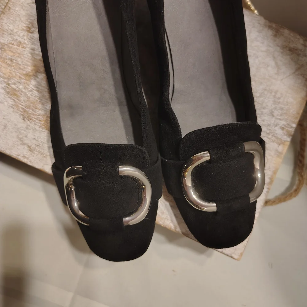 Stuart Weitzman Black Flats with Silver Accent